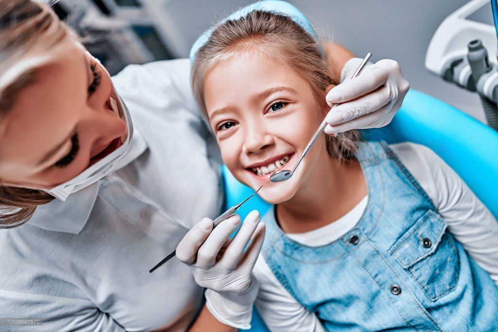 ребенку удалить постоянный зуб